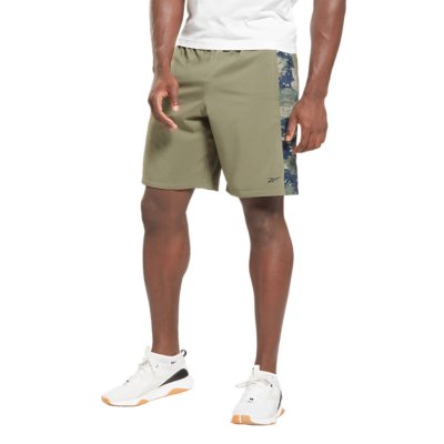 short de training homme train camo woven