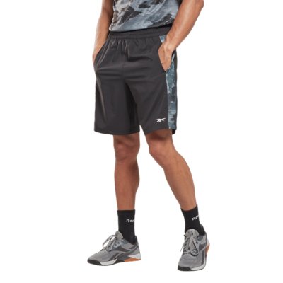 short de training homme train camo woven